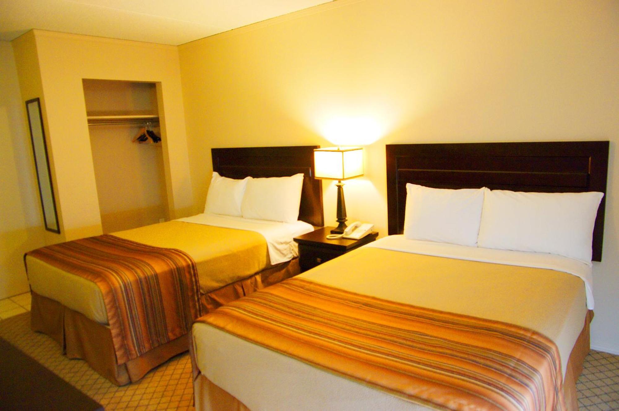 Airport Traveller's Inn YYC Rom bilde
