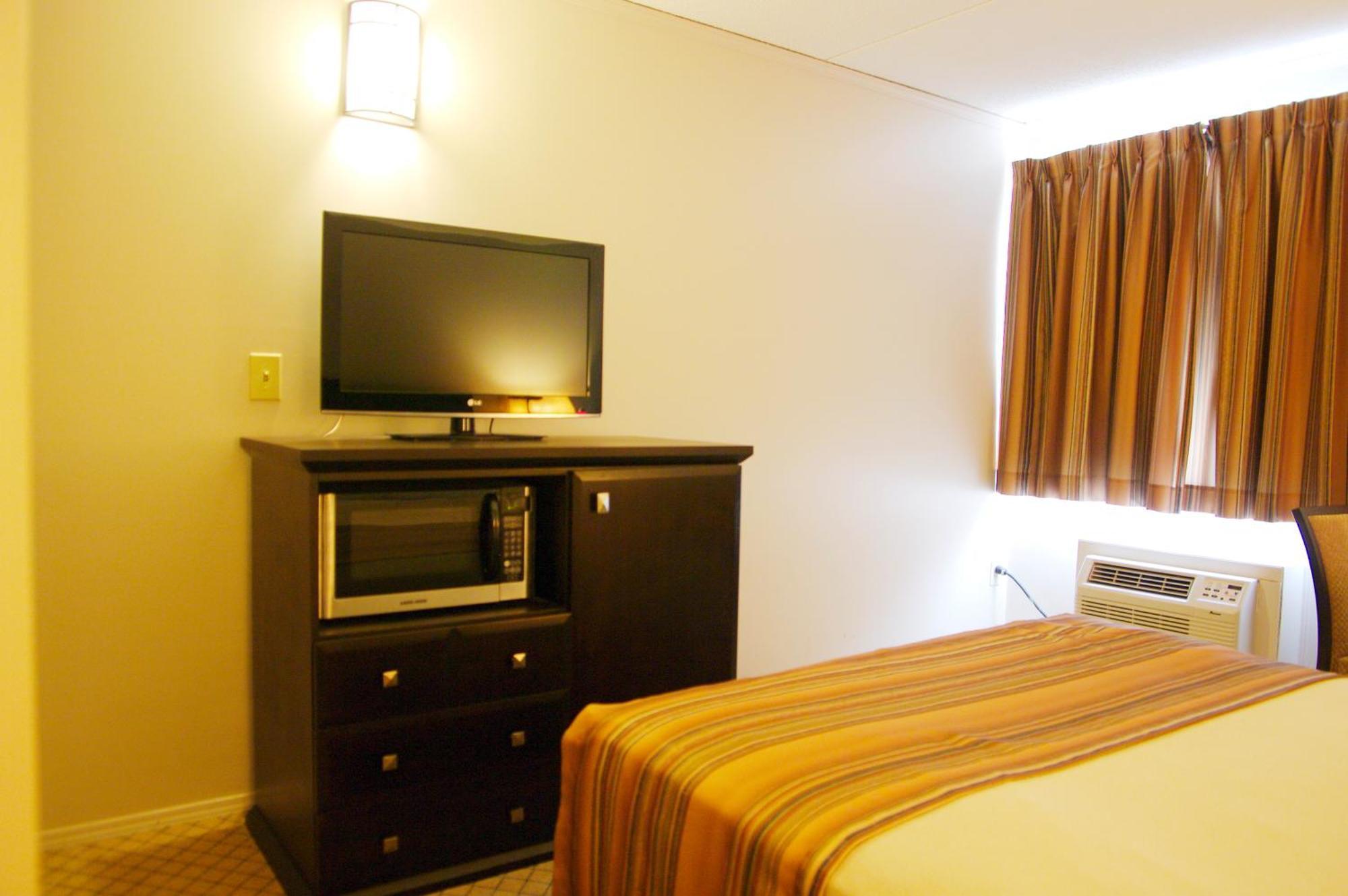 Airport Traveller's Inn YYC Rom bilde