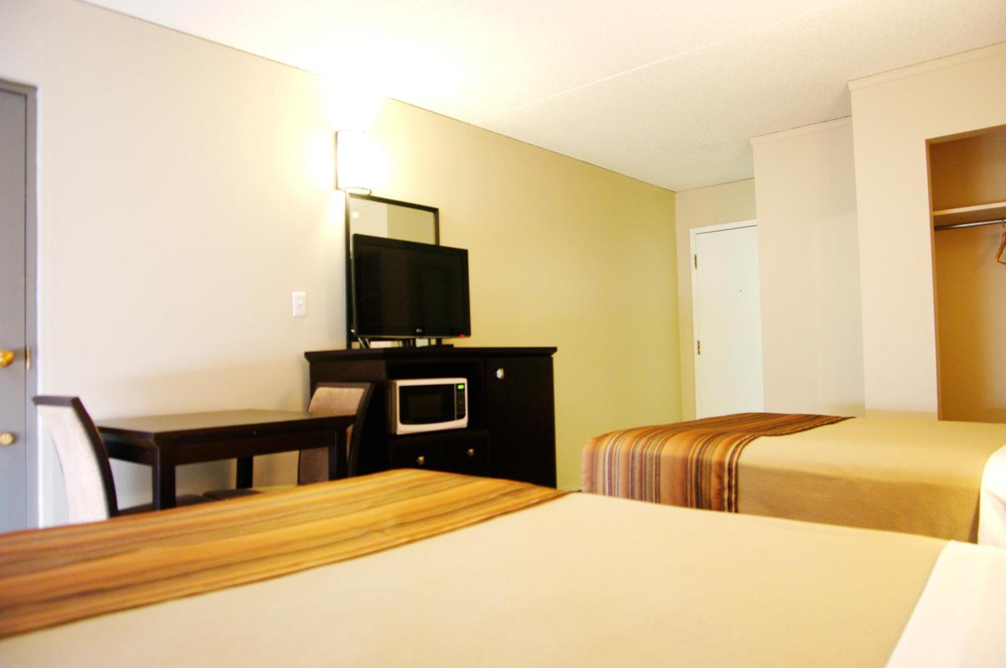 Airport Traveller's Inn YYC Rom bilde