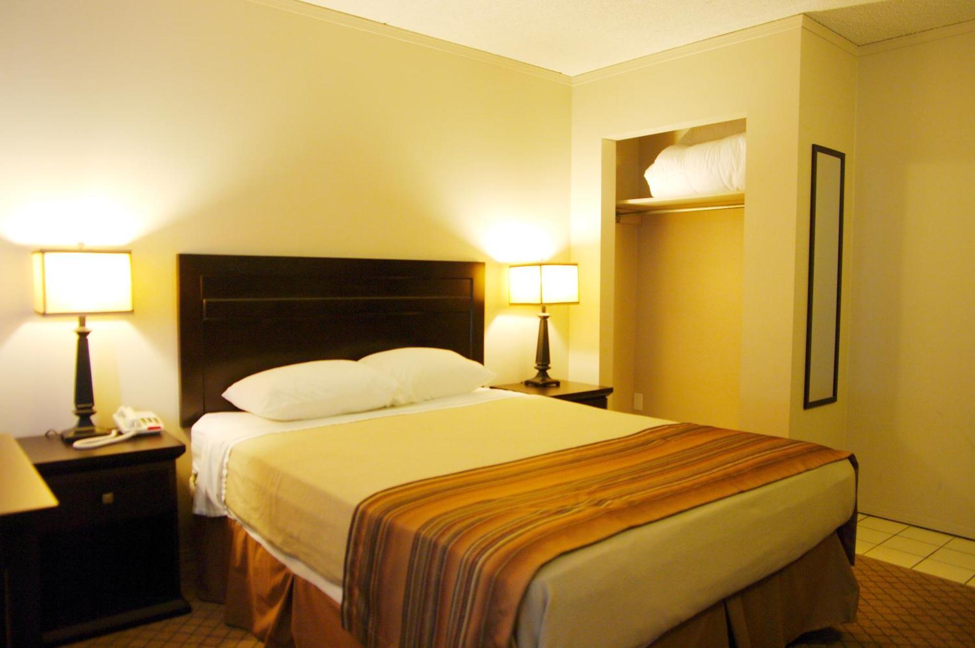 Airport Traveller's Inn YYC Rom bilde