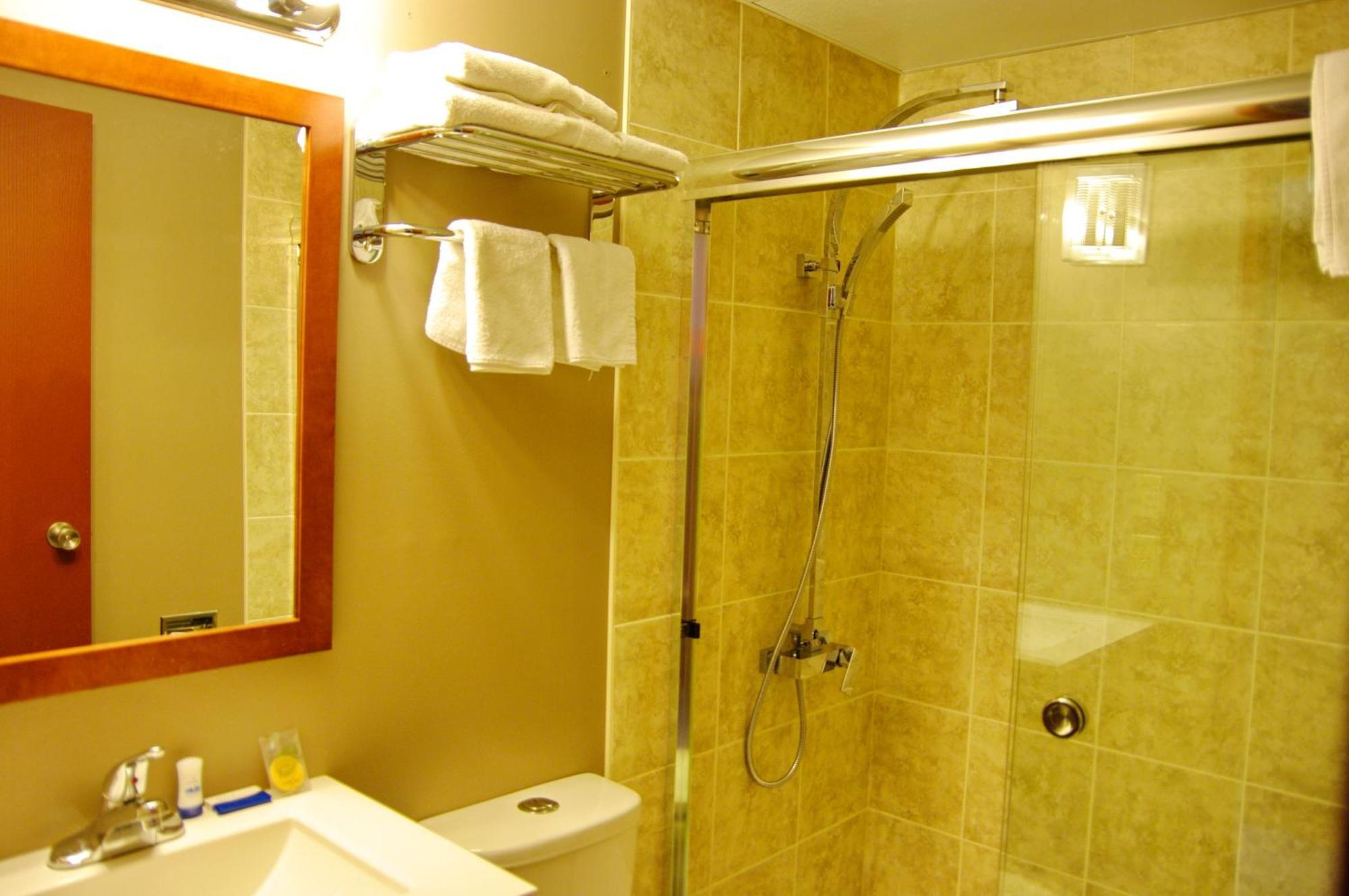 Airport Traveller's Inn YYC Rom bilde