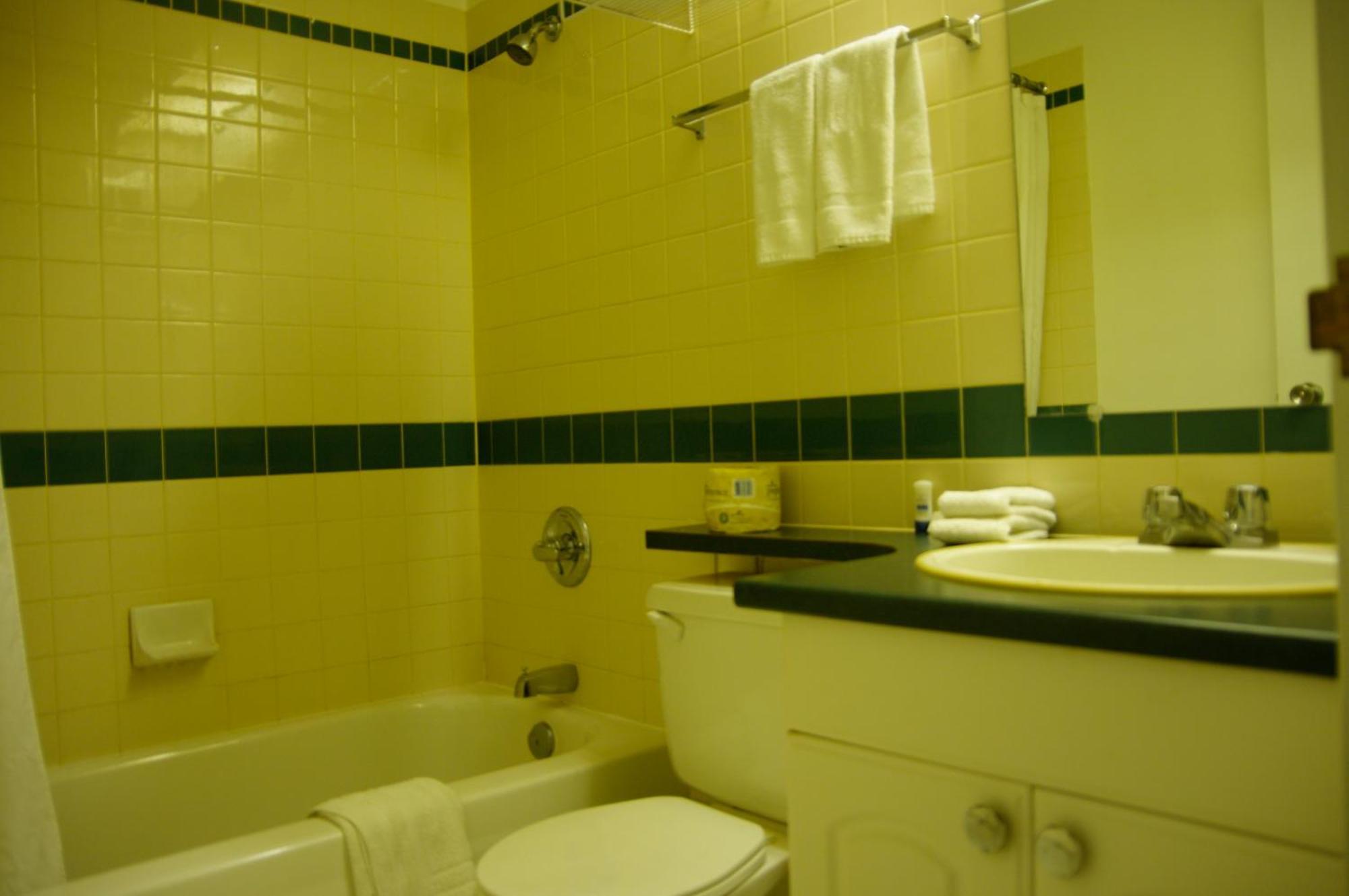 Airport Traveller's Inn YYC Rom bilde