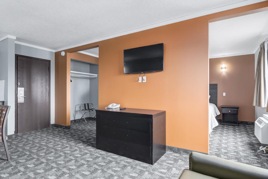 Airport Traveller's Inn YYC Rom bilde