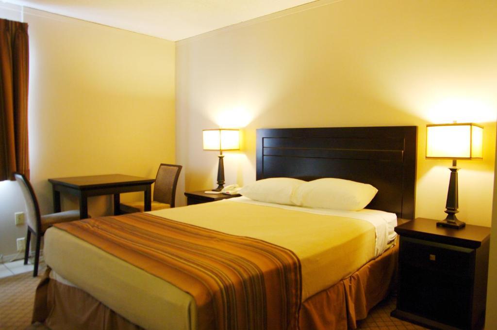 Airport Traveller's Inn YYC Rom bilde