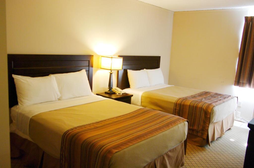 Airport Traveller's Inn YYC Rom bilde